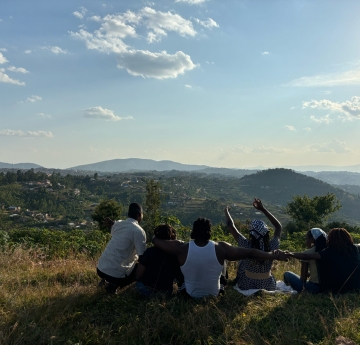 group of students overlooking a scenic view
