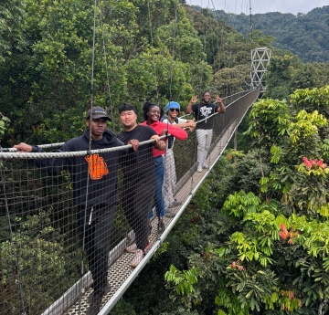 group of students in rwanda bridge